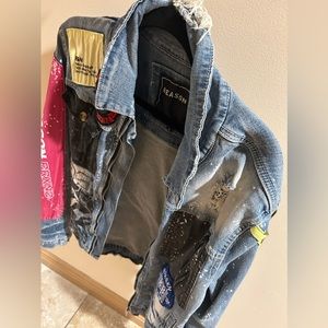 Large distressed Jean Reason jacket.
